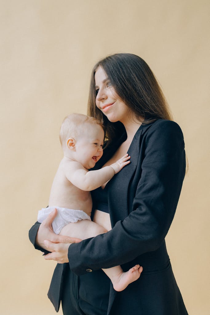 Portrait of Woman Holding Her Baby